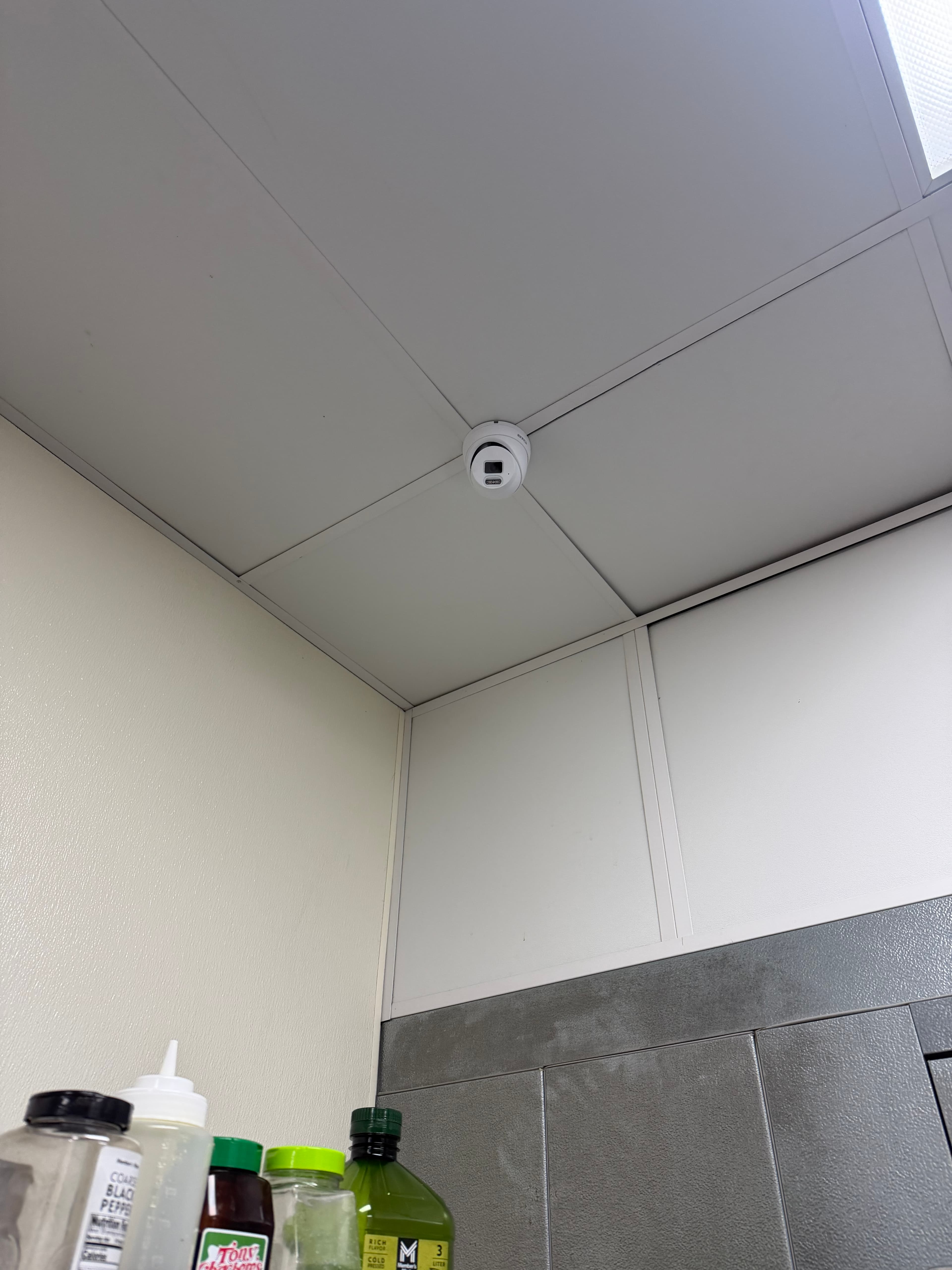 CCTV camera coverage in dining area — Stacked & Tossed