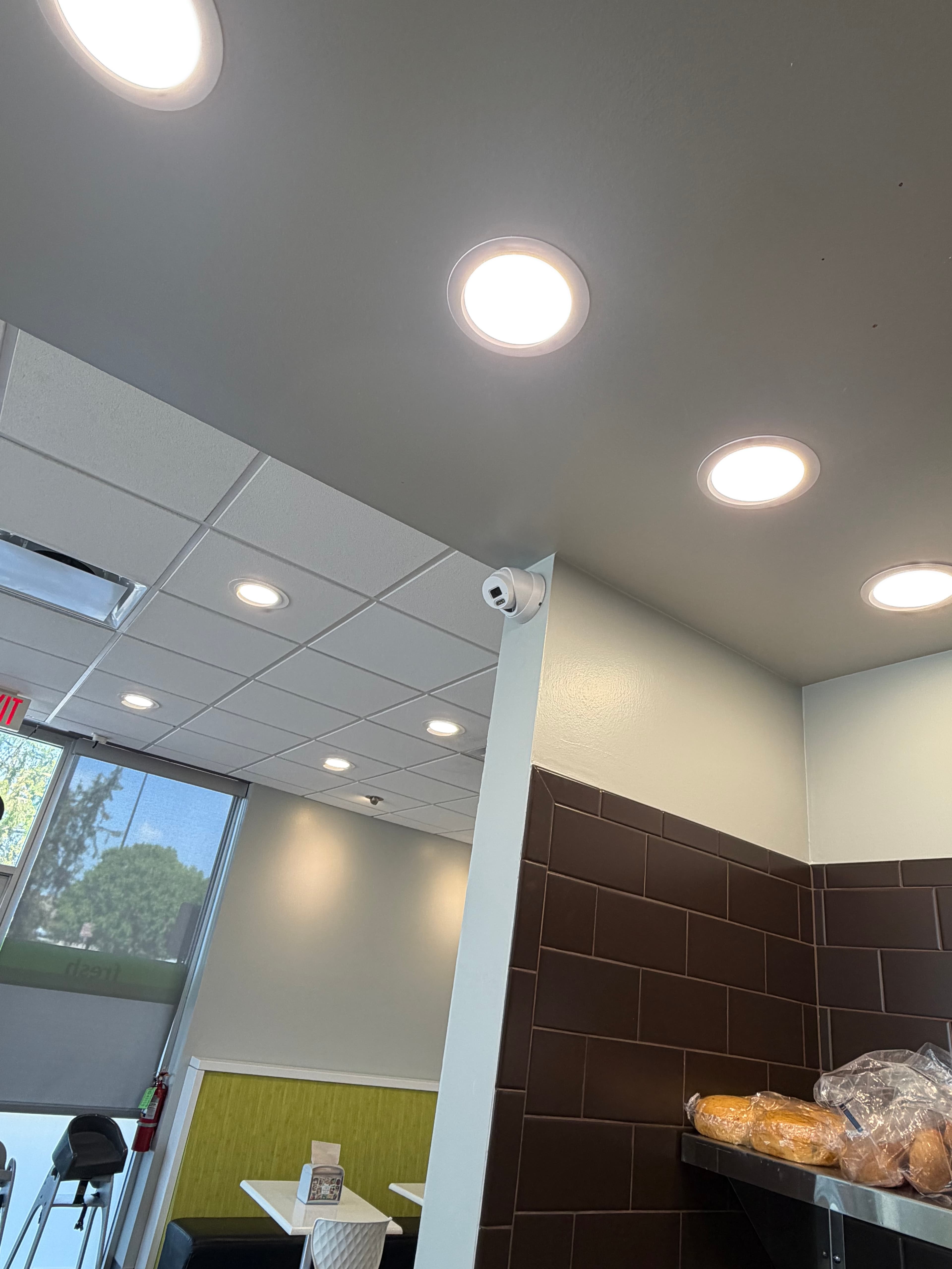 CCTV camera in kitchen and dining space — Stacked & Tossed