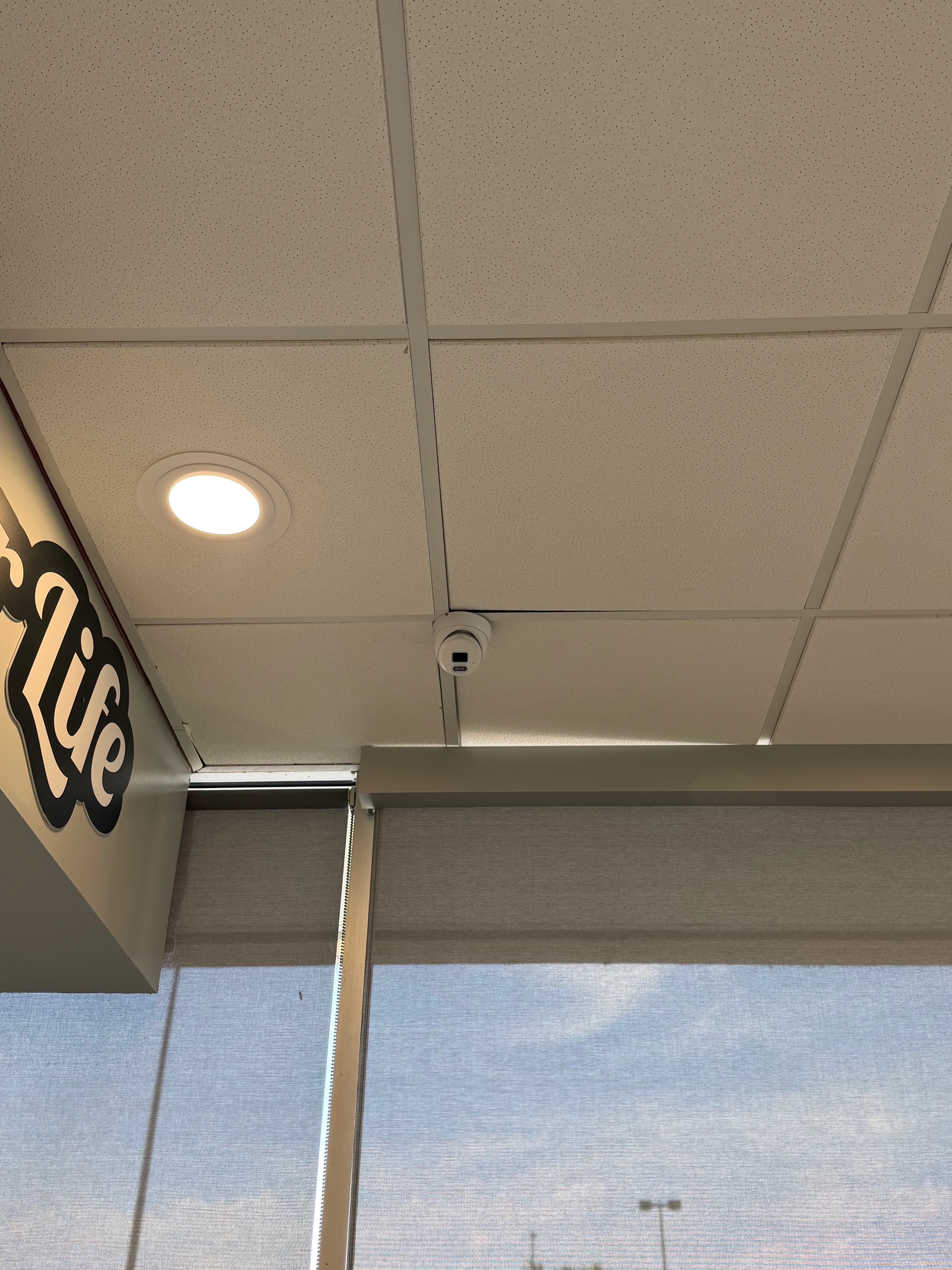 Security camera install near front windows — Stacked & Tossed